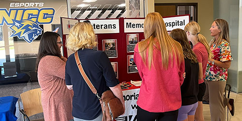Community members and students visit a booth at the 网赌网站 Career Fair.