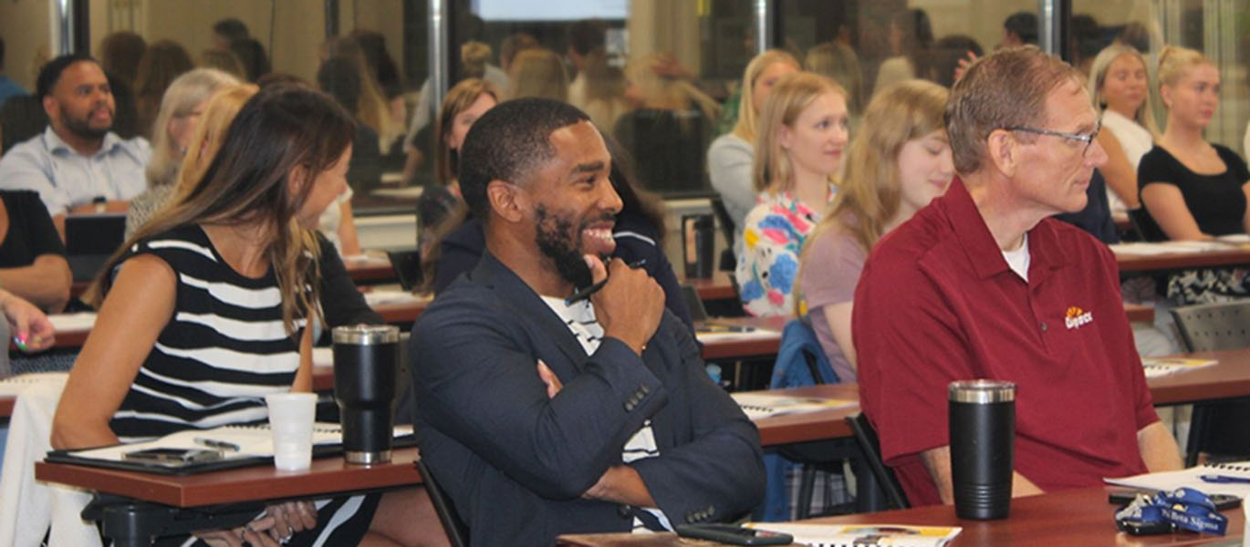 photo of attendees from a past conference