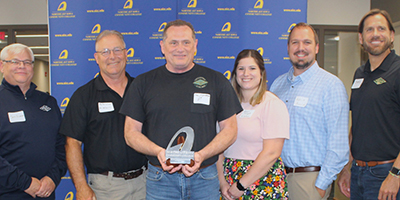 AY McDonald representatives accept award_tile image